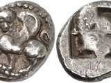 a close up of a silver coin with an image of a man on it