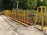 a long yellow fence that is next to a road
