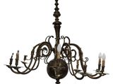 a large brass chandelier with five lights hanging from the ceiling