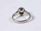 an image of a silver ring with a pearl on top of it