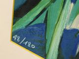 a picture of a painting of blue flowers on the wall