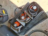 a suitcase with various items in it on the ground