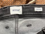 the back of a pair of jeans with a label on it