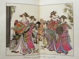 an open book with a picture of a woman in a kimono dress and a woman in a kimono dress