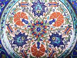 a colorful plate with a floral design on it