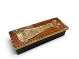 a wooden box with a musical instrument inside of it