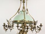 a chandelier hanging from the ceiling in a room