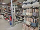 many bags and bags on the shelves in the store