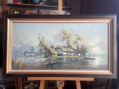 a picture of a painting on a easel in a room