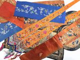 many different types of oriental rugs on the floor