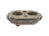 an image of a ceramic bowl with two compartments