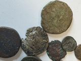 a lot of coins that are on the table