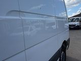 a white van that is parked in a parking lot