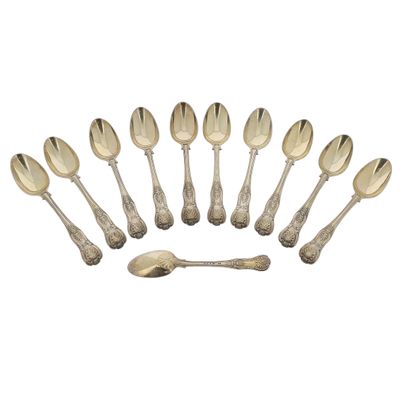 a group of silver spoons and spoon spoons on a white background