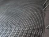 a metal grate on the floor of a building