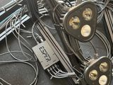 a lot of wires and lights on the floor