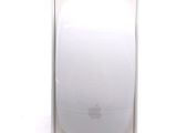 a white apple mouse sitting in a box on a table