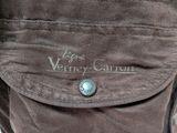 the back of a brown jacket with a button on it