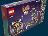 a box that has a lego house inside of it