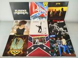 various album covers of various albums on a white surface