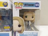 funko pop television vinyl figures of meredith grey and meredith grey on display