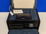 a small black box with a note inside of it