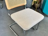 a chair that is sitting in the middle of a room