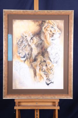 une photo d'un tableau représentant trois lions sur un chevalet
