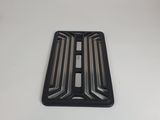 un plateau en plastique noir posé sur une surface blanche