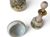 three vases that are sitting next to each other on a table