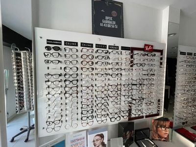 many glasses on display in the store for people to see