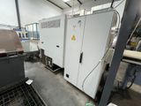 a machine that is sitting inside of a building