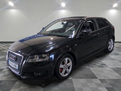 an image of a black audi wagon parked in a garage