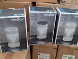 three boxes of air purifiers are stacked on top of each other