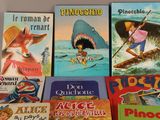 de nombreux livres pour enfants qui se trouvent sur la table