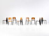 a group of chairs that are lined up in a row
