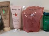 some different types of skin care products are lined up on a table