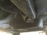 a close up of a car ' s exhaust pipe and exhaust pipe