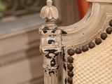 an image of a chair with a beaded chain on it