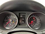 a close up of a car dashboard with gauges and speedometers