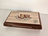 a wooden box with a picture on it sitting on a table