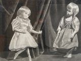 two children that are standing next to each other