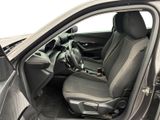 the interior of a car with the door open and the driver ' s seat up