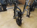 an image of a gym with equipment in the background