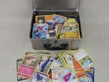 a suitcase filled with lots of cards sitting on the floor