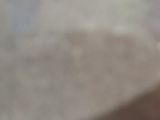 a blurry photo of a person holding a cell phone