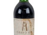 a bottle of wine that is sitting on a table