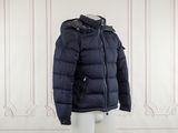 the jacket is blue and has a hood on it