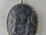 an image of a black and gold locke with an image of a man and a woman