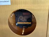 a close up of a small device in a box